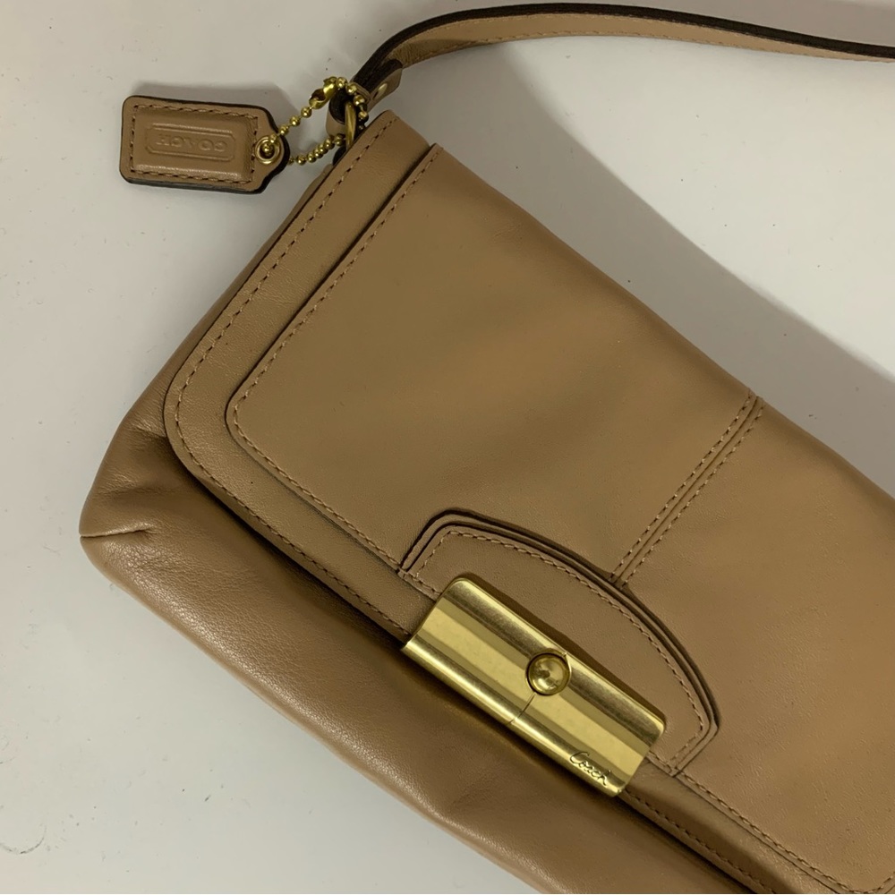 Beige Coach Clutch Purse with Strap
